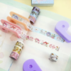 Kit com 9 mini washi tapes com suporte Sanrio - Image 2
